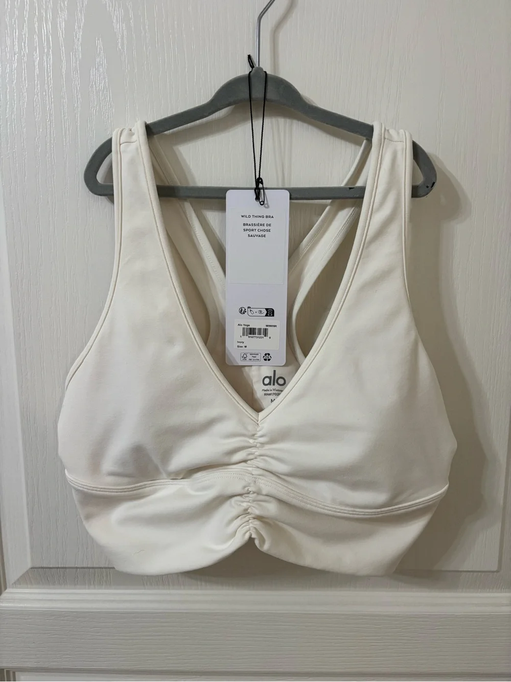 Alo Yoga wild thing bra in ivory size medium